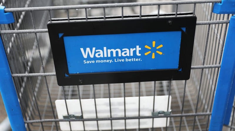 a walmart sign on a shopping cart