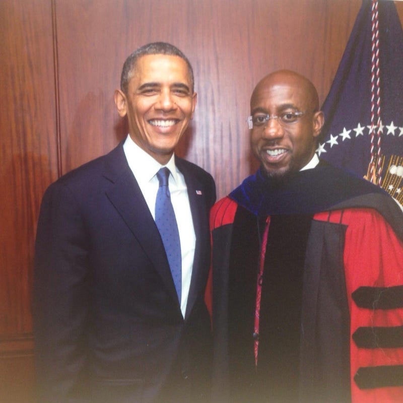 Former President Obama is shown in a photo with candidate for U.S. Senate Dr Raphael Warnock