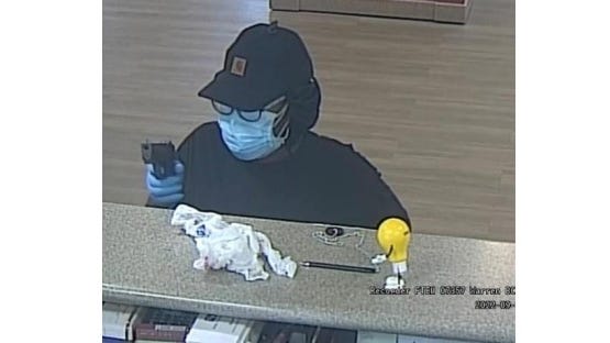 Police release photo, description of woman who robbed Warren bank at gunpoint