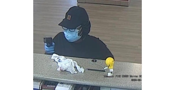 Suspect caught on camera in Warren bank robbery