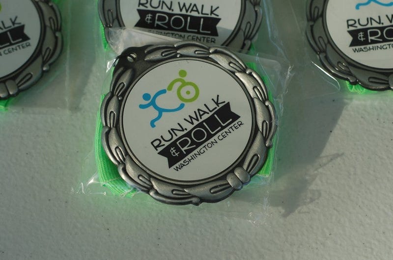 Washington Center Run Walk & Roll medals