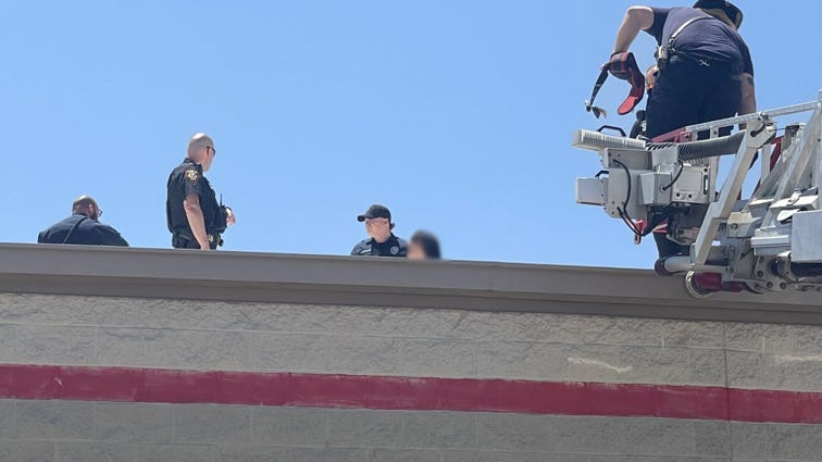 Officers, firefighters, deputies team up to help woman undergoing mental health crisis