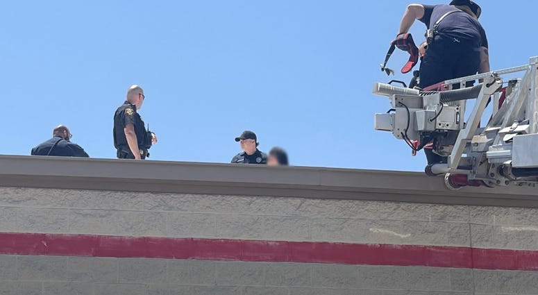Officers, firefighters, deputies team up to help woman undergoing mental health crisis