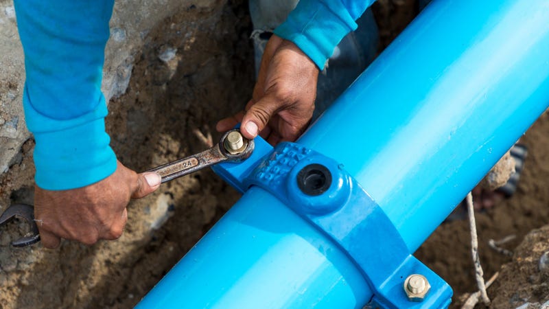 Construction site with new water pipes in the ground