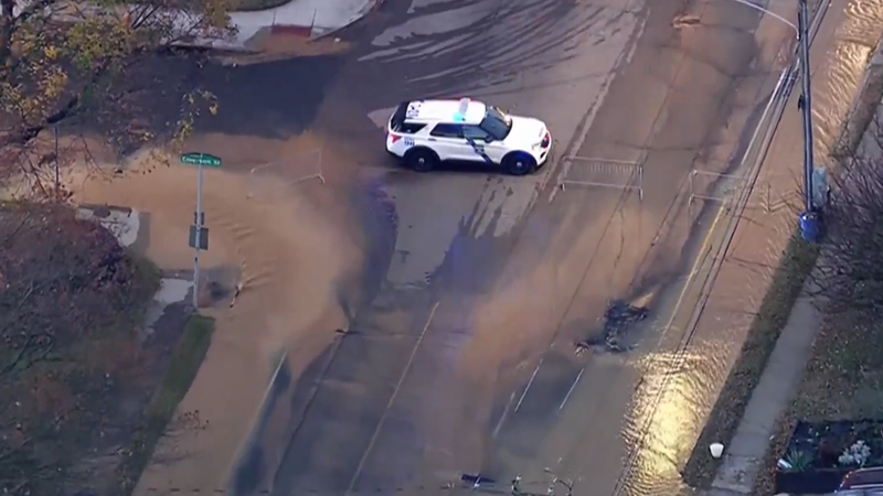 water main break floods street 