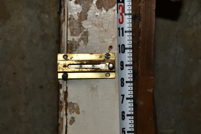 A lock inside the Waterbury home where a man was allegedly held captive since childhood