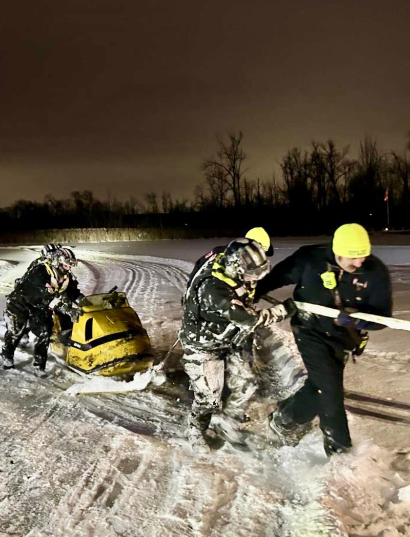 Snowmobile recovered from Pleasant Lake