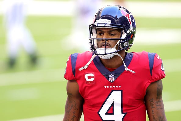 Deshaun Watson heads to the Texans sideline. 