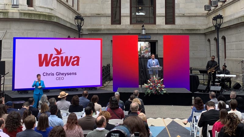 Wawa President and CEO Chris Gheysens addresses an audience at City Hall during the unveiling ceremony for the 2024 Welcome America festival.