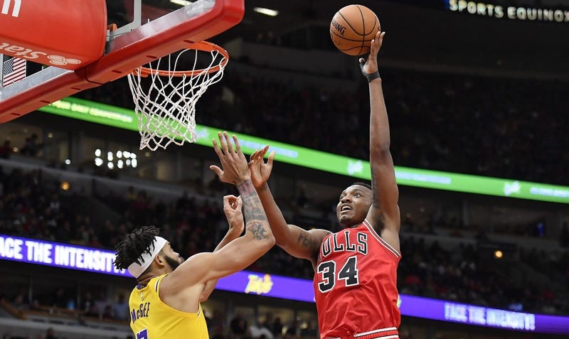 Bulls center Wendell Carter Jr. (34) shoots against Lakers center JaVale McGee. 