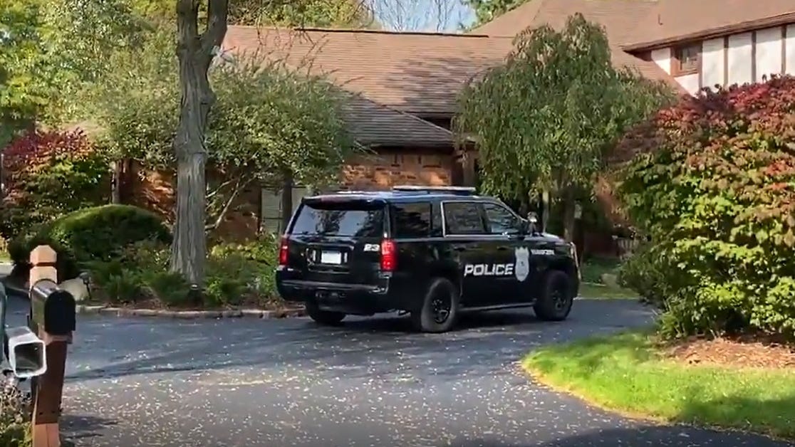 Person of interest in custody in execution-style murders of woman, 6-year-old boy