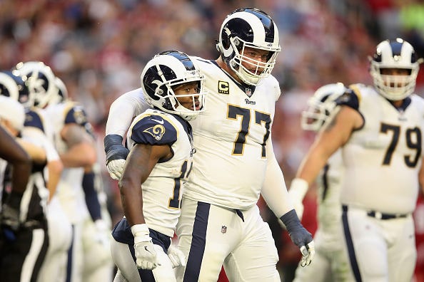 Rams T Andrew Whitworth consoles Brandin Cooks