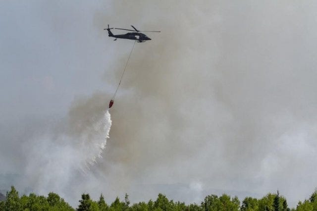 Alasak Guard helicopter over wildfire