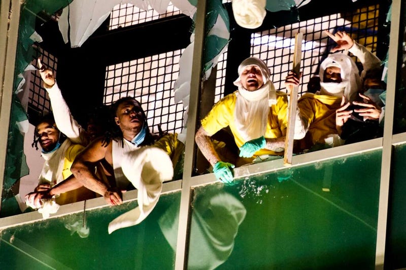 Inmates at the City Justice Center in downtown St. Louis protested the jail conditions and yelled through windows they smashed to a crowd below on April 4, 2021