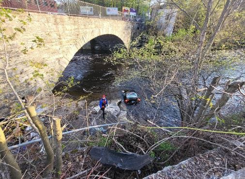 car in river