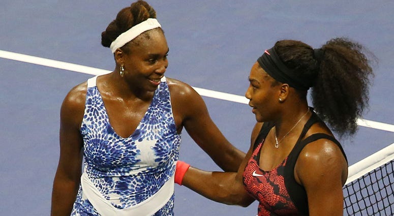 Sep 8, 2015; New York, NY, USA; Venus Williams of the United States (left) greets sister Serena Williams of the United States after their match on day nine of the 2015 U.S. Open tennis tournament at USTA Billie Jean King National Tennis Center. Mandatory