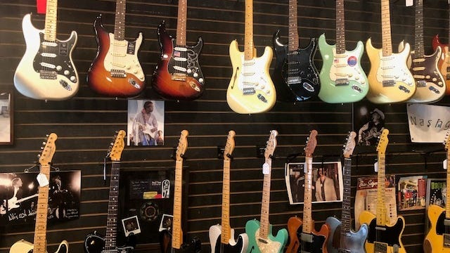 Owner of Willie's Guitar Shop in St. Paul shares some guitar history and Rolling Stones stories before their show Sunday