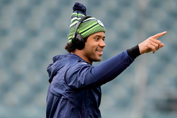 Russell Wilson warms up before a Seahawks game.