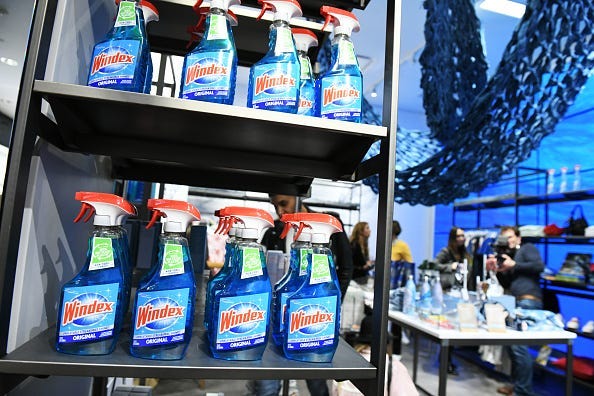 multiple bottles of windex window cleaner