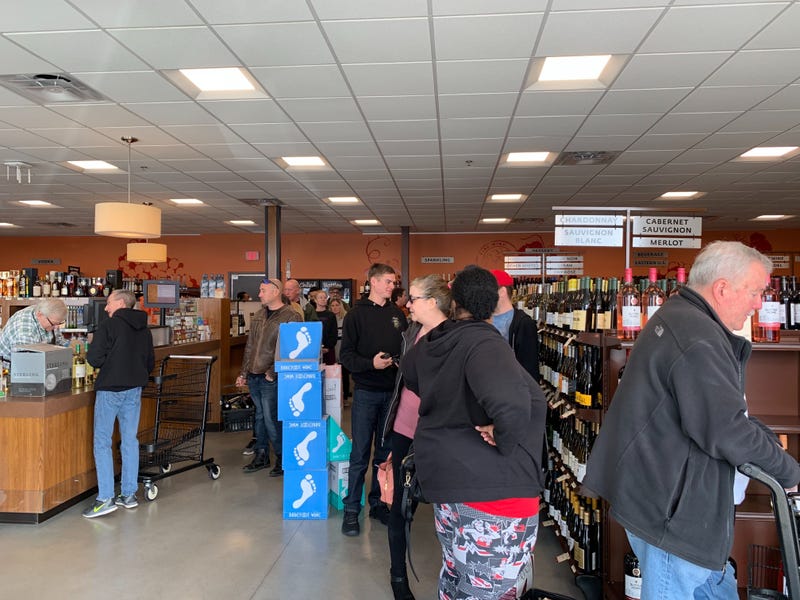 Customers descended upon the Fine Wine and Good Spirits store in Bensalem Sunday before its announced closing.