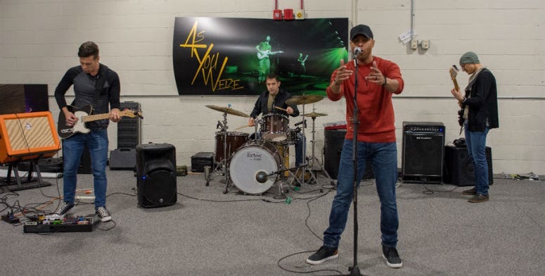 Sgt. 1st Class Samuel Woodberry, instructor with the U.S. Army Recruiting and Retention College, sings with the Army&apos;s Musical Outreach Team 