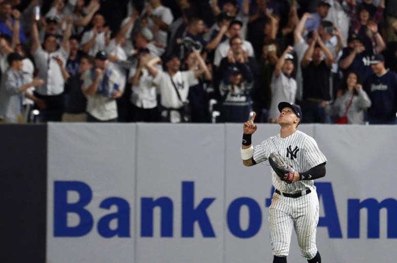 Aaron Judge #99 of the New York Yankees celebrates after defeating the Oakland Athletics by a score of 7-2 to win the American League Wild Card Game at Yankee Stadium on October 03, 2018.