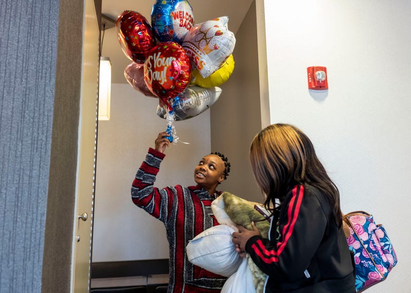 Rachel Bridgeman (left) and her sister Sarah (right) celebrated Rachel’s release from Allegheny County Jail. It took a cooperative, community-based effort to help free Rachel after she was deemed incompetent to stand trial.
