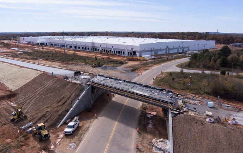 New BMW Logistics Center with Freeman Farm Road bridge under construction.