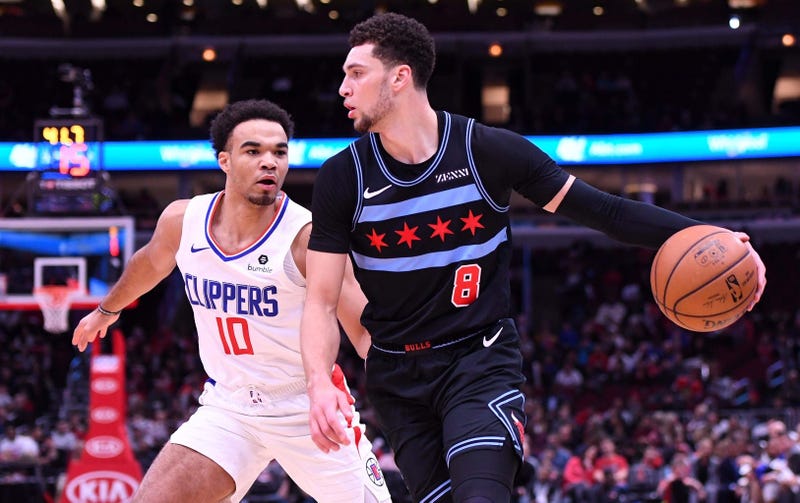 Bulls guard Zach LaVine (8) dribbles the ball against Clippers guard Jerome Robinson (10).