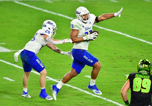 Tulsa's Zaven Collins celebrates recovering the football