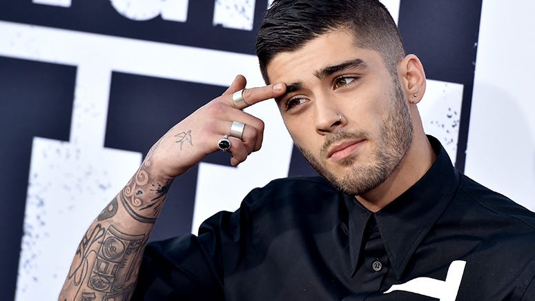 ZAYN rocks red hair and new dad bod for 'Better' video