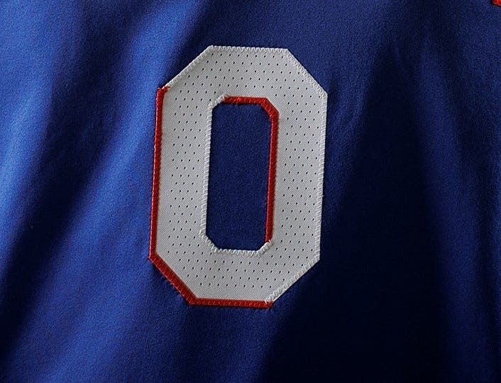 zero numeral on jersey, close up