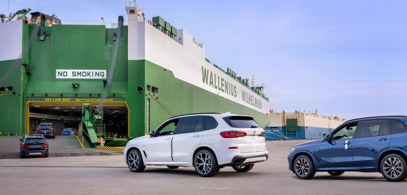 BMW X5 SAVs are loaded onto a ship at the port in Charleston, SC.