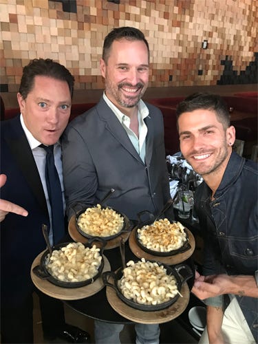Liam and artist Ed Granger serving “Mac & Cheese” (Photo credit: Foodie Chap/Liam Mayclem)