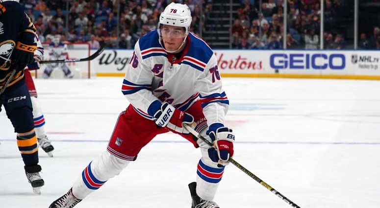 Rangers defenseman Brady Skjei skates up the ice with the puck against the Buffalo Sabres on Oct. 6, 2018, at KeyBank Center in Buffalo, New York.  