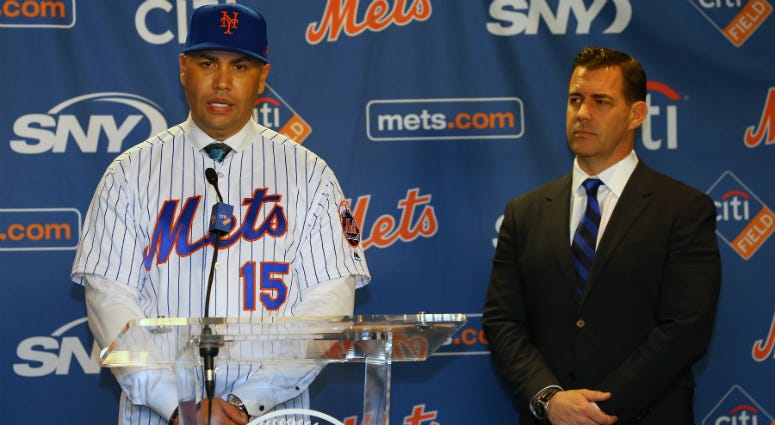 Carlos Beltran talks after being introduced by General Manager Brodie Van Wagenen, right, during a press conference at Citi Field on November 4, 2019 in New York City.