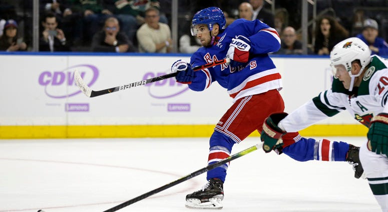 Rangers defenseman Tony DeAngelo shoots and scores the game-winning goal in overtime against the Minnesota Wild on Nov. 25, 2019, at Madison Square Garden. 
