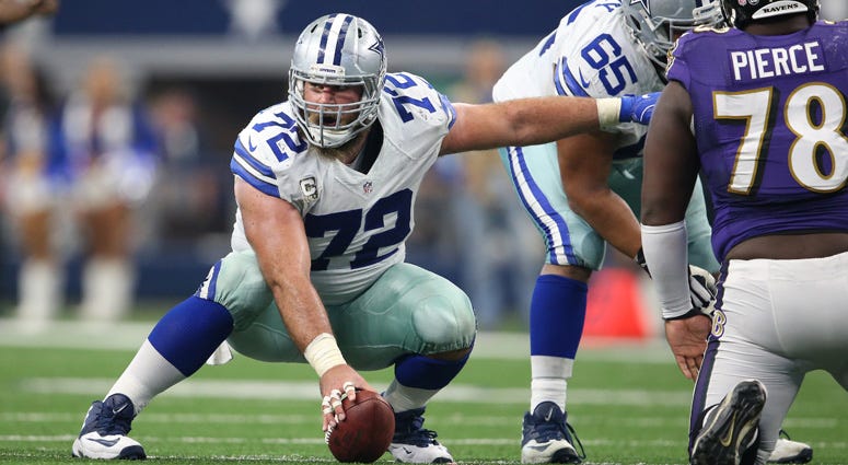 Cowboys center Travis Frederick signals at the line of scrimmage against the Baltimore Ravens on Nov. 20, 2016, at AT&T Stadium in Arlington, Texas.