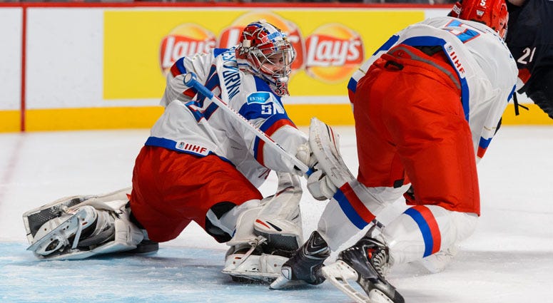 Igor Shesterkin of Team Russia stretches out the pad and blocker to make a save against the United States in a quarterfinal round game in the 2015 IIHF World Junior Hockey Championships on Jan. 2, 2015, at the Bell Centre in Montreal. 