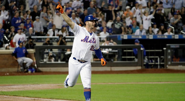 New York Mets' Pete Alonso trots the bases after hitting a solo home run during the fourth inning of a baseball game, Tuesday, Aug. 27, 2019, in New York. With the home run, Alonso broke the Mets' single season home run record.