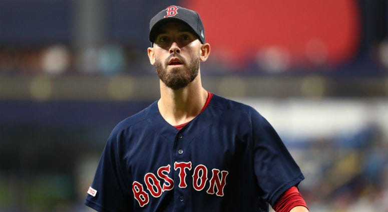 Boston Red Sox starting pitcher Rick Porcello (22) looks on at the end of the third inning against the Tampa Bay Rays at Tropicana Field