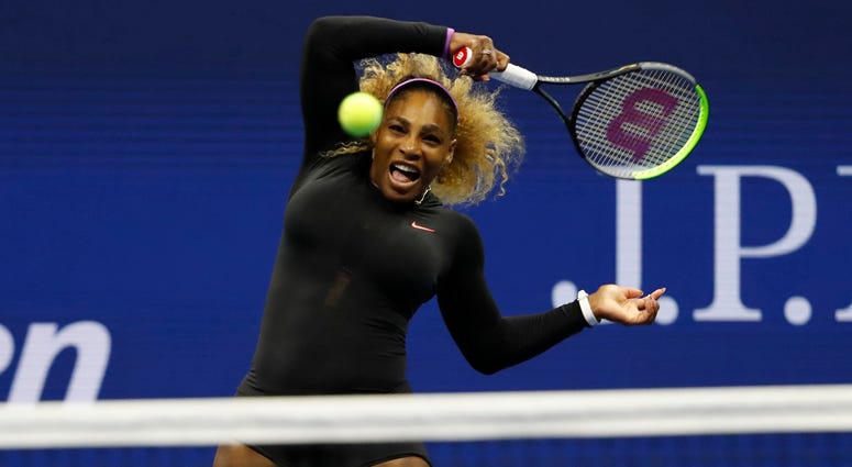 Serena Williams hits a forehand against Maria Sharapova on Aug. 26, 2019, at the U.S. Open. 