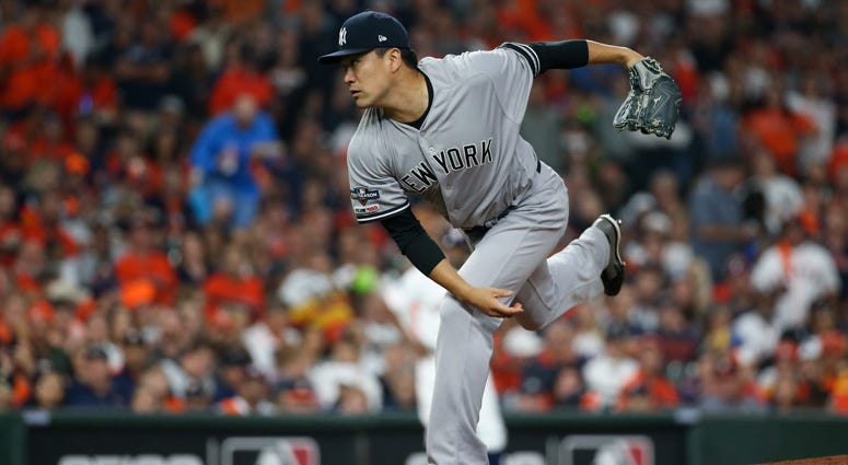 Masahiro Tanaka pitches in Game 1 of the ALCS on Oct. 12, 2019, in Houston. 