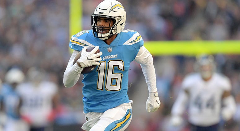 Oct 21, 2018; London, United Kingdom; Los Angeles Chargers wide receiver Tyrell Williams (16) scores on a 75-yard touchdown reception in the first quarter against the Tennessee Titans  at Wembley Stadium. Mandatory Credit: Kirby Lee-USA TODAY Sports