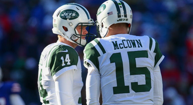 Sam Darnold and Josh McCown talk during a time-out in the second quarter at New Era Field.