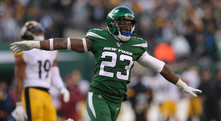 Jets cornerback Arthur Maulet celebrates in front of Pittsburgh Steelers wide receiver JuJu Smith-Schuster Dec 22, 2019; East Rutherford, New Jersey