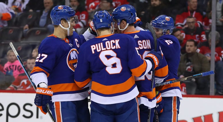 The Islanders celebrate after a goal by right wing Jordan Eberle against the New Jersey Devils on Jan. 7, 2020, at the Prudential Center.
