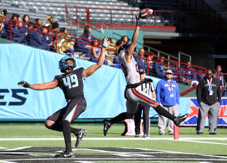 Dravon Askew-Henry of the New York Guardians breaks up a pass intended for Donald Parham #49 of the Dallas Renegades at an XFL football game against the Dallas Renegades on March 07, 2020 in Arlington, Texas.