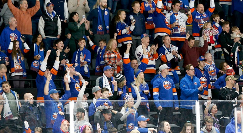 Fans react after the Islanders defeat the Buffalo Sabres on Dec. 14, 2019, at Nassau Veterans Memorial Coliseum in Uniondale.  
