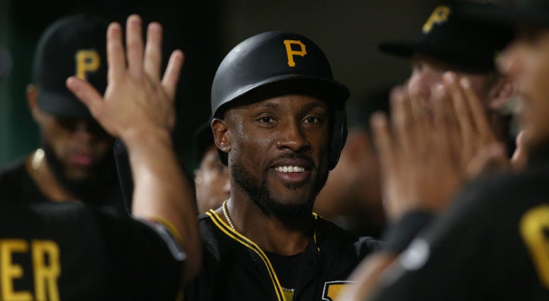Sep 6, 2019; Pittsburgh, PA, USA; Pittsburgh Pirates center fielder Starling Marte (6) high-fives in the dugout after scoring a run against the St. Louis Cardinals during the seventh inning at PNC Park
